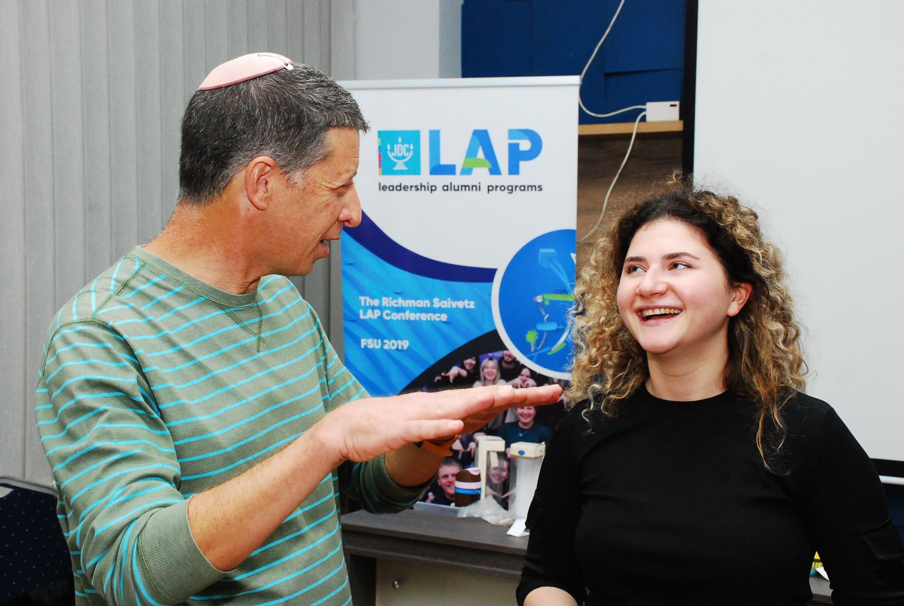 Asi, left, at a conference for alumni of JDC's leadership programs in Tblisi, Georgia.
